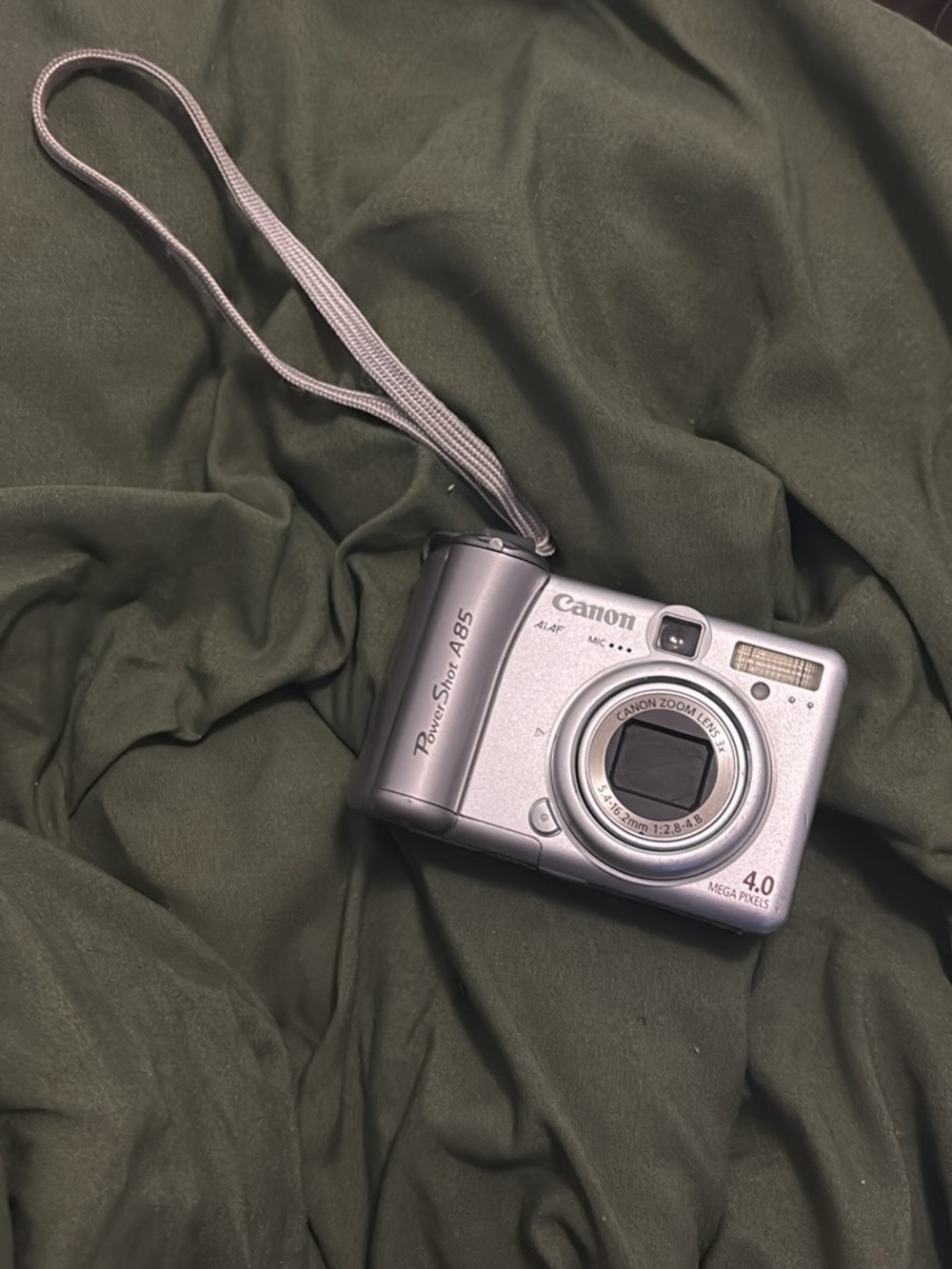 Canon Silver Compact Point-and-Shoot Digital Camera with Wrist Strap